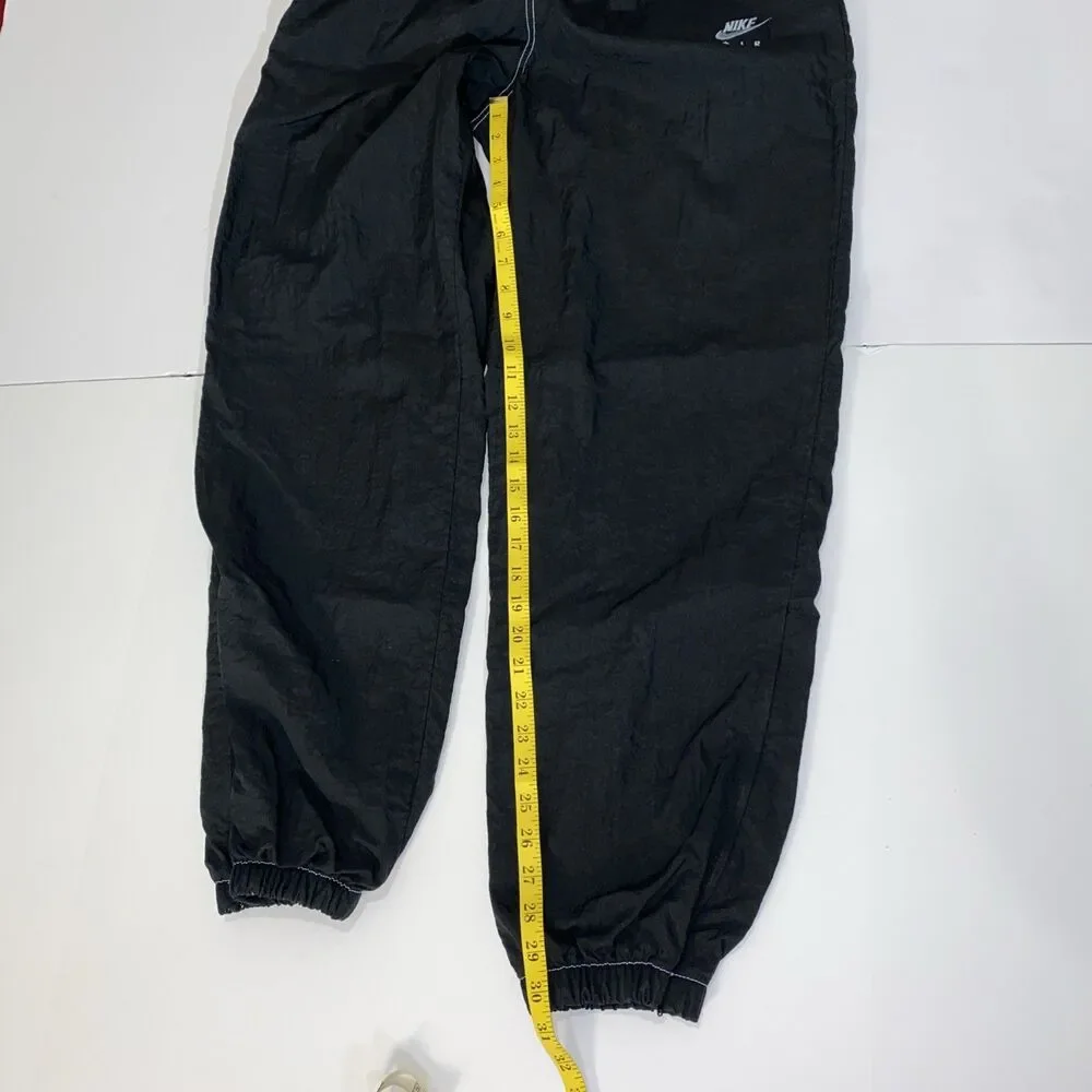 Nike Windbreaker Track Pants Men Large Black Ankle Zip Lined Baggy